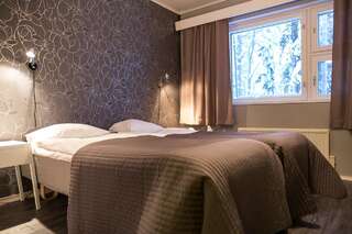 Отель Kuerkievari KuerHotel Экясломполо Стандартный двухместный номер с 2 отдельными кроватями-8